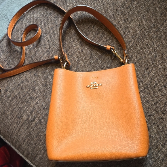 Coach Handbags - Coach Small Town Bucket Bag  pebbled leather In Orange Taffy